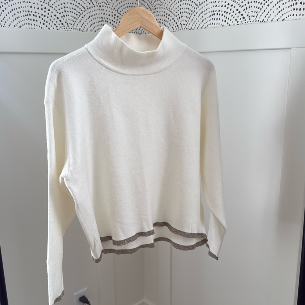Anthropologie Maeve Carys sweater. Cream with metallic threads at hems.